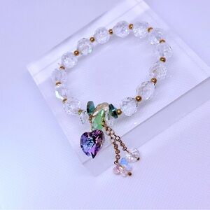 Gold and White Beaded Bracelet with Charms